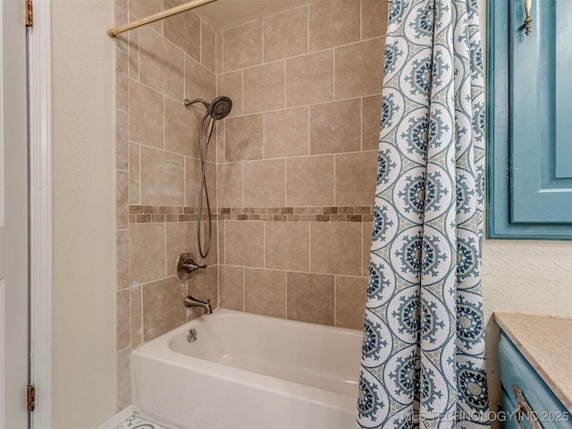 bathroom featuring shower / bath combination with curtain and vanity