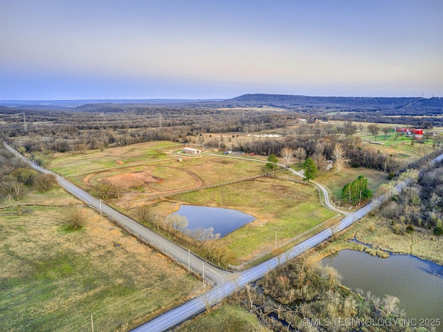 bird's eye view with a rural view and a water view