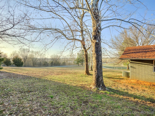 view of yard with central AC