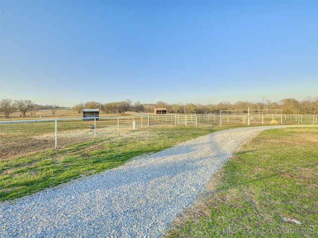 view of street featuring a rural view and a pole building