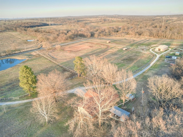 aerial view with a water view and a rural view