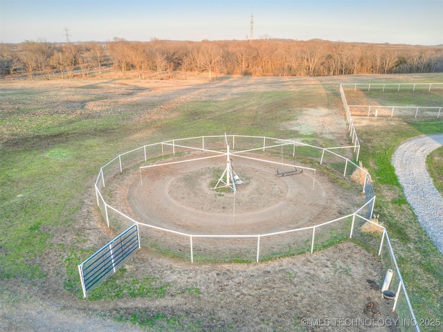 birds eye view of property with a rural view