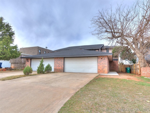 view of front facade featuring fence, a shingled roof, concrete driveway, a garage, and brick siding