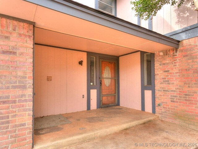 entrance to property with covered porch