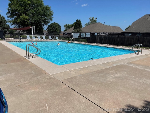 11906 E 99th St, Owasso, OK 74055 - community pool featuring a patio area