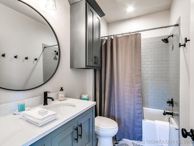 full bathroom with vanity, toilet, and shower / tub combo with curtain