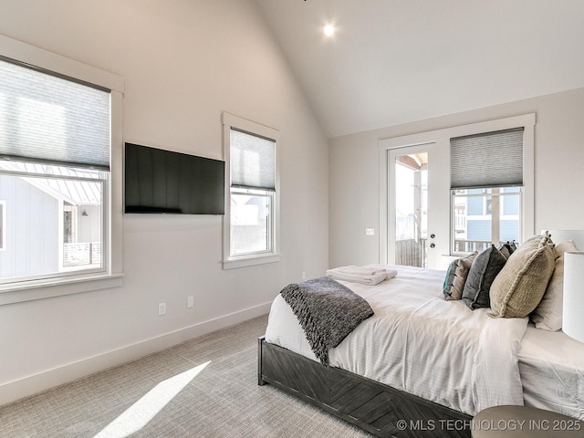 bedroom featuring carpet flooring, multiple windows, high vaulted ceiling, and baseboards