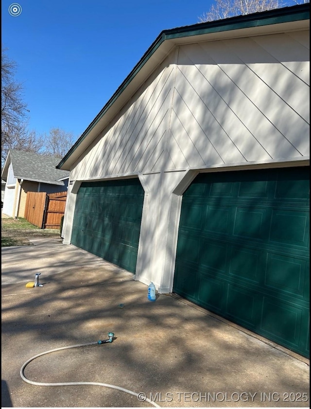 garage featuring fence