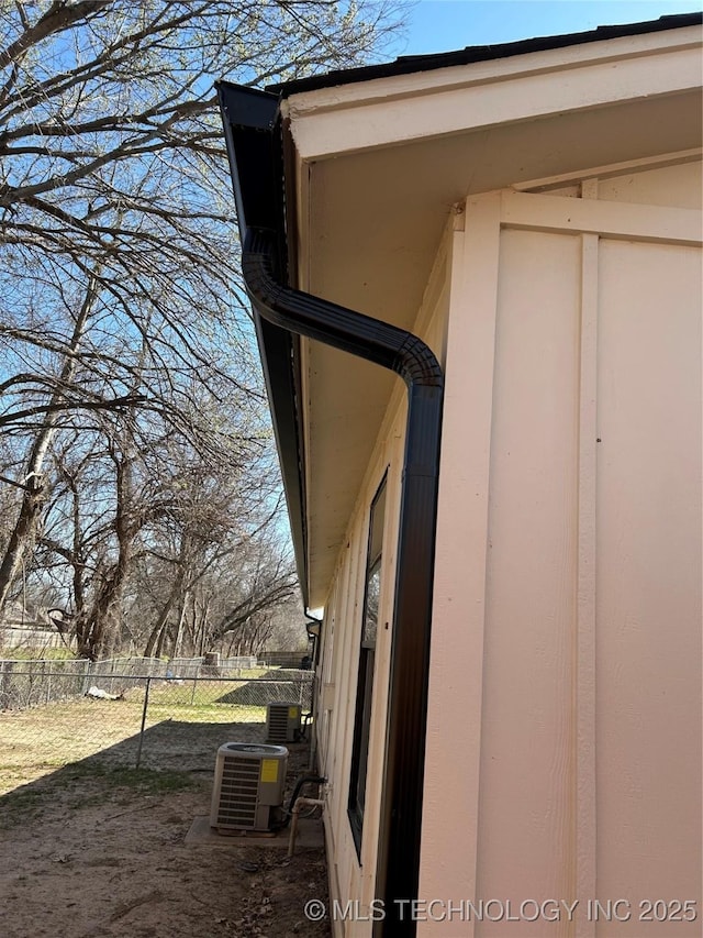 exterior details with cooling unit and fence