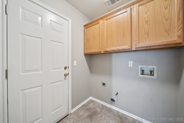 laundry area with hookup for a washing machine, visible vents, gas dryer hookup, cabinet space, and electric dryer hookup