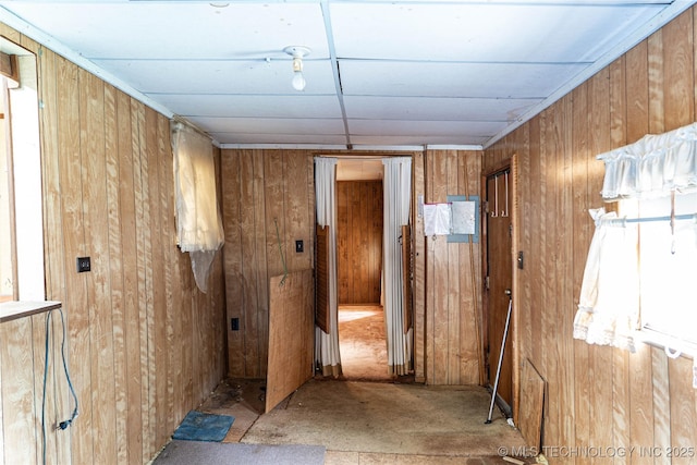 hallway with wooden walls