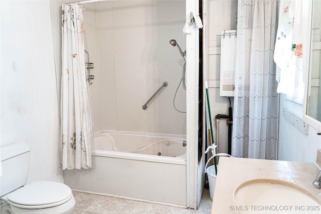 bathroom with a sink, toilet, tile patterned flooring, and a combined bath / shower with jetted tub