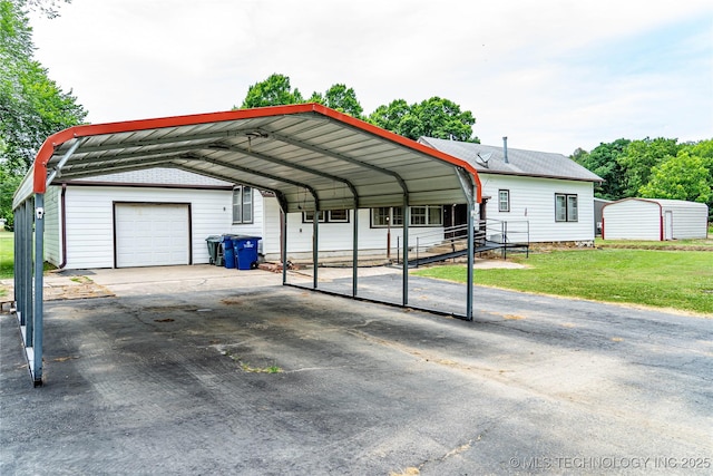 view of car parking featuring a detached carport, a garage, and driveway