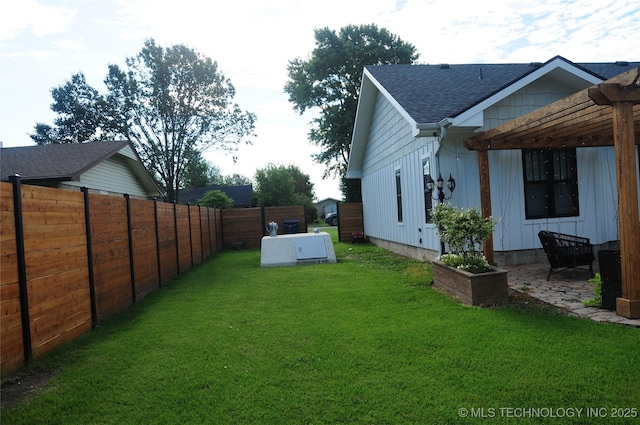 view of yard featuring a fenced backyard