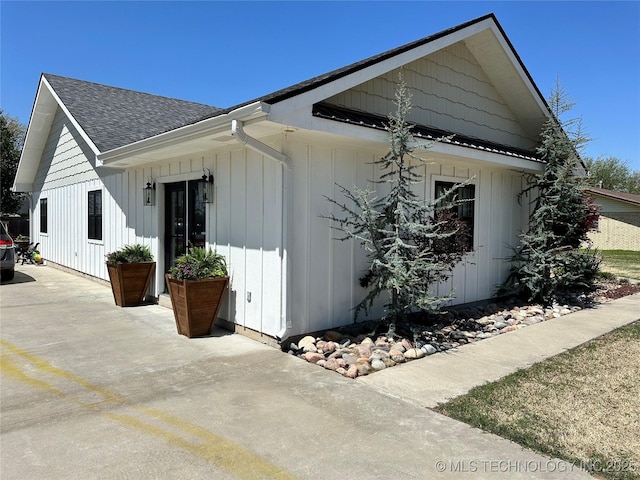 view of home's exterior featuring a shingled roof