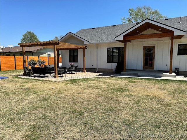 back of house with roof with shingles, fence, a pergola, and board and batten siding