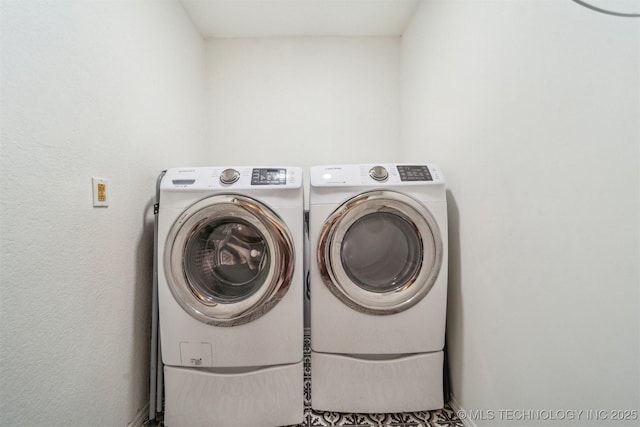 laundry area featuring laundry area and separate washer and dryer