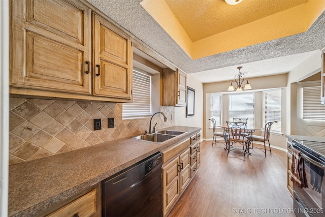 kitchen with dark wood-type flooring, dishwasher, decorative backsplash, range with electric stovetop, and a sink