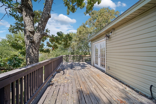 wooden deck featuring french doors