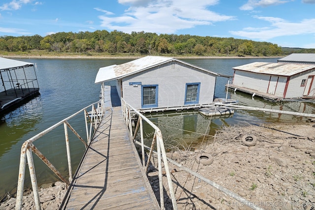 dock area featuring a water view