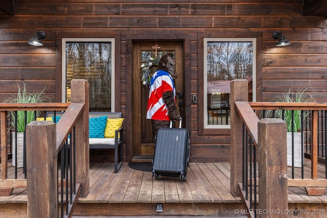 doorway to property with a deck