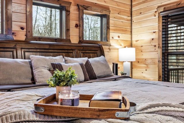 bedroom with wooden walls