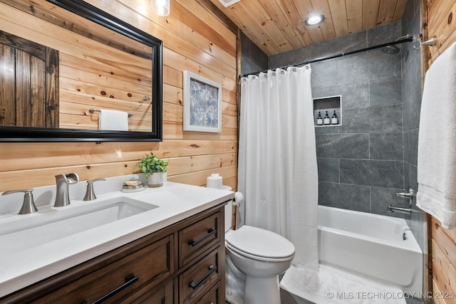 full bathroom featuring vanity, wooden walls, wood ceiling, toilet, and shower / tub combo with curtain