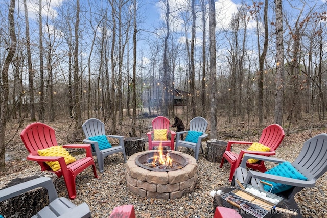 view of patio with a fire pit