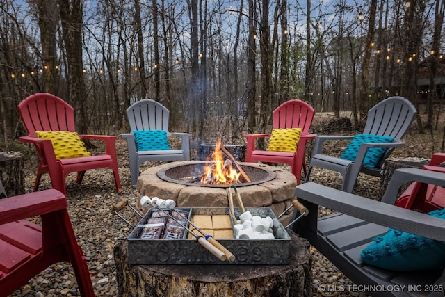 view of patio featuring a fire pit