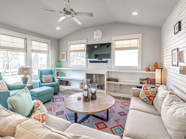 29 Boardwalk Unit F, Carlton Landing, OK 74432 - living room with a ceiling fan, vaulted ceiling, a fireplace, recessed lighting, and wood finished floors