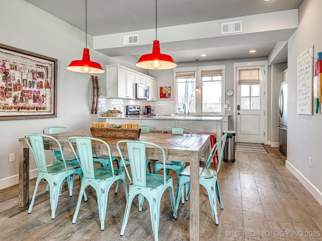 29 Boardwalk Unit F, Carlton Landing, OK 74432 - dining area with light wood-type flooring and recessed lighting