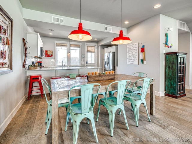29 Boardwalk Unit F, Carlton Landing, OK 74432 - dining room with light wood-style floors and recessed lighting