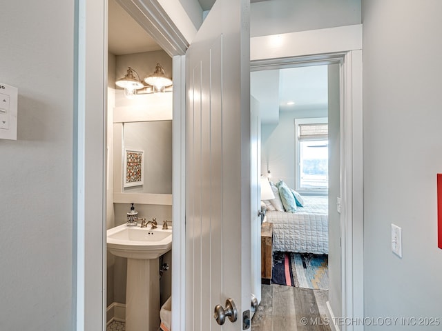 29 Boardwalk Unit F, Carlton Landing, OK 74432 - bathroom with wood finished floors and connected bathroom