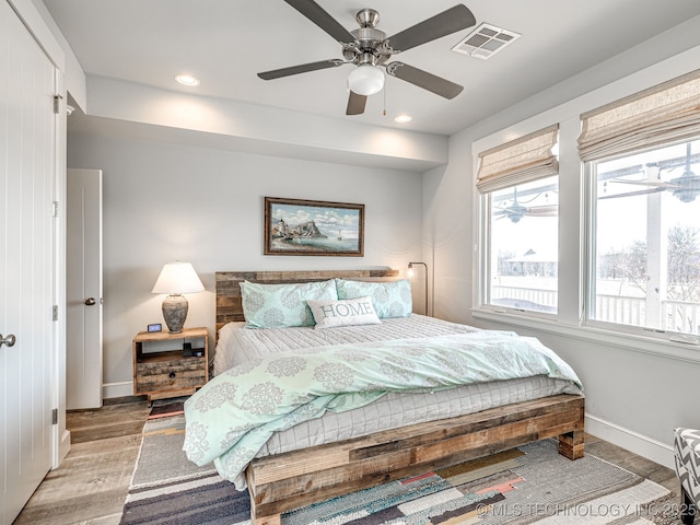 29 Boardwalk Unit F, Carlton Landing, OK 74432 - bedroom with recessed lighting, light wood-style flooring, and ceiling fan
