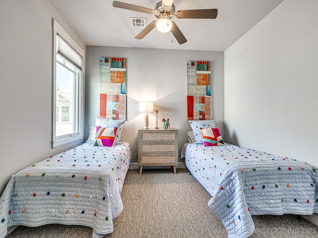 carpeted bedroom featuring a ceiling fan