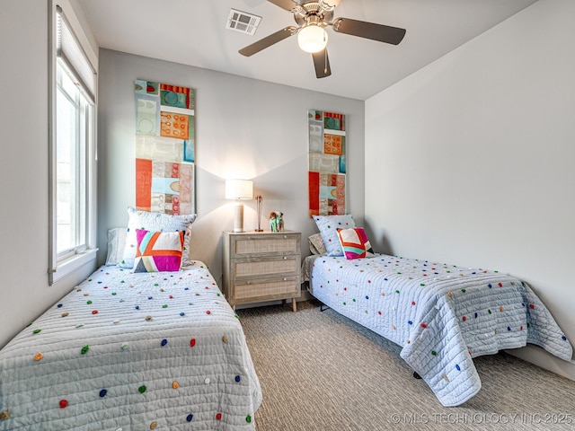29 Boardwalk Unit F, Carlton Landing, OK 74432 - carpeted bedroom featuring multiple windows and a ceiling fan
