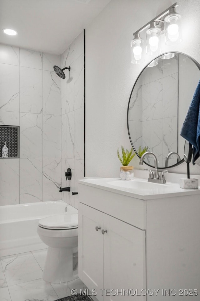 bathroom featuring bathtub / shower combination, toilet, vanity, and marble finish floor