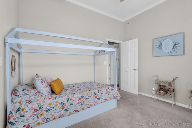 carpeted bedroom with baseboards and crown molding