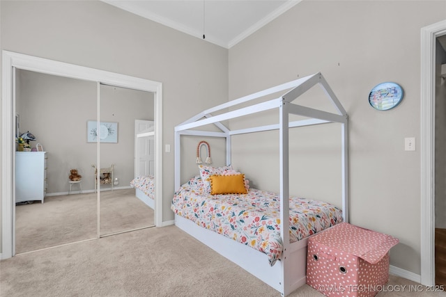 carpeted bedroom featuring crown molding and baseboards