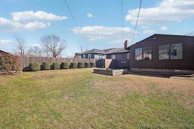 view of yard with fence