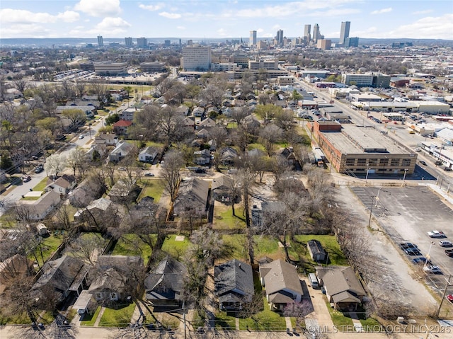 drone / aerial view featuring a city view