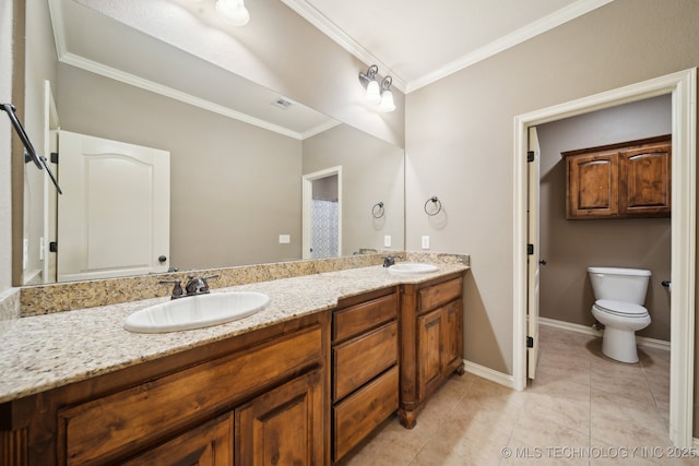 bathroom featuring a sink, ornamental molding, double vanity, and tile patterned flooring