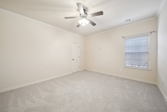 unfurnished room with visible vents, light carpet, a ceiling fan, crown molding, and baseboards