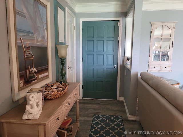 interior space with dark wood finished floors, baseboards, and ornamental molding