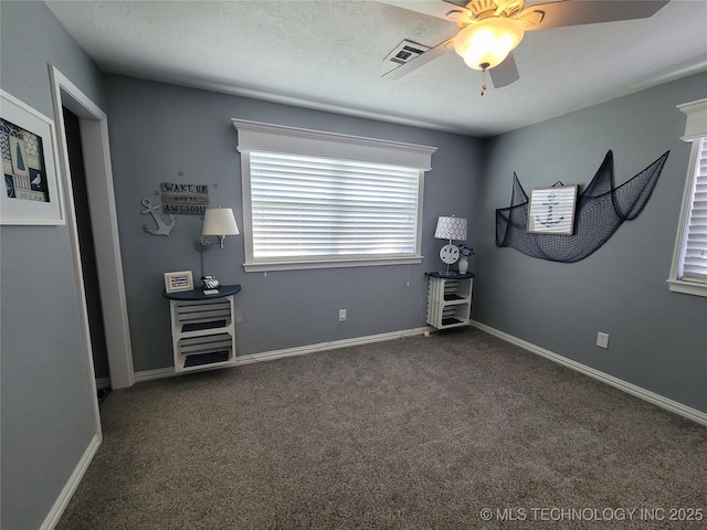 misc room featuring visible vents, baseboards, a ceiling fan, and carpet floors