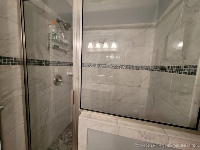 full bath with a shower stall