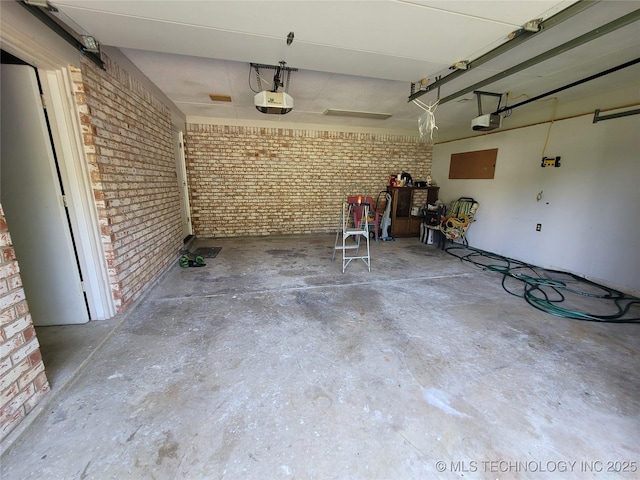 garage featuring a garage door opener