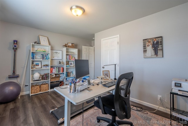 home office featuring dark wood finished floors and baseboards