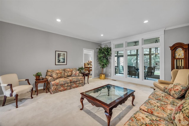 living room with recessed lighting, light colored carpet, and ornamental molding