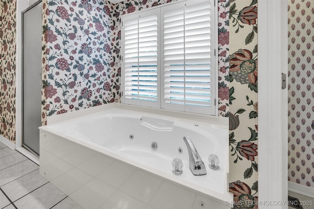 full bath featuring wallpapered walls, a stall shower, and a whirlpool tub